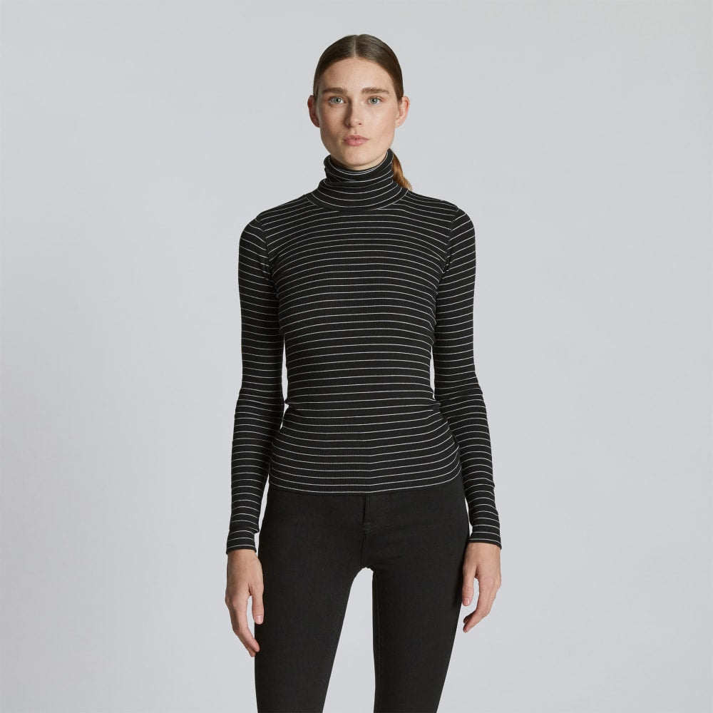 womens-supima-rib-turtleneck-black-canvas-tan | primary