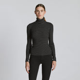 womens-supima-rib-turtleneck-black-canvas-tan | primary