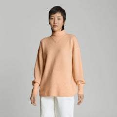 womens-bouncy-wool-sweater-apricot | primary