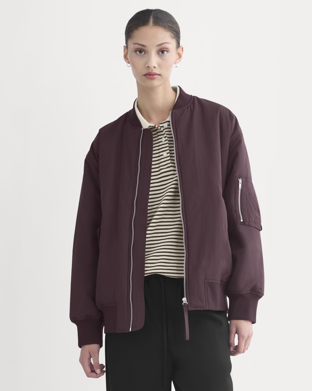 womens-renew-oversized-puffer-bomber-deep-plum | primary