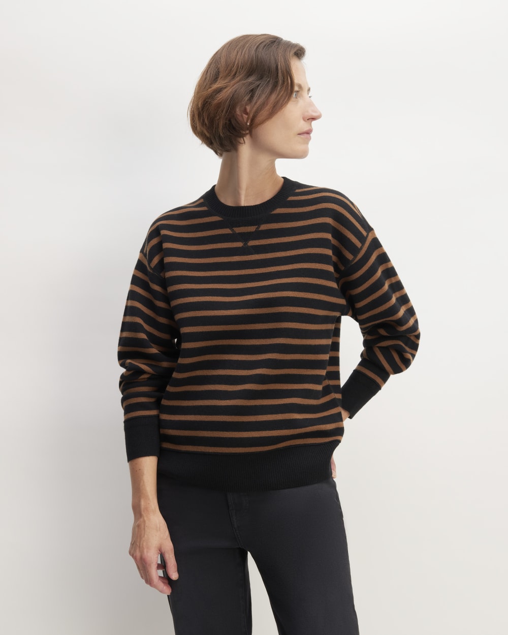 womens-knitted-sweatshirt-black-dark-camel | primary