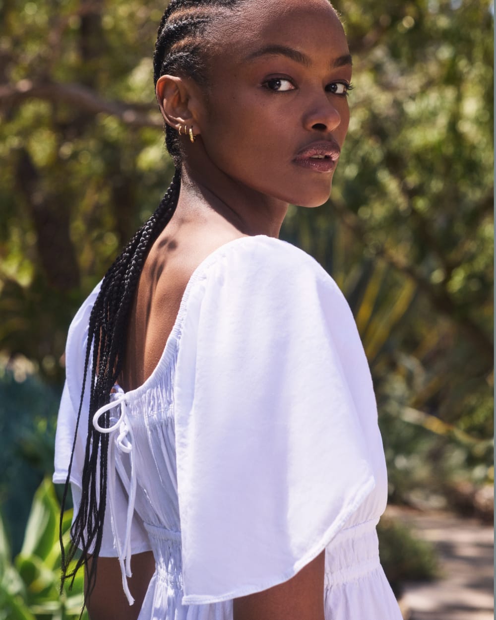 womens-flutter-sleeve-dress-stretch-linen-white | editorial