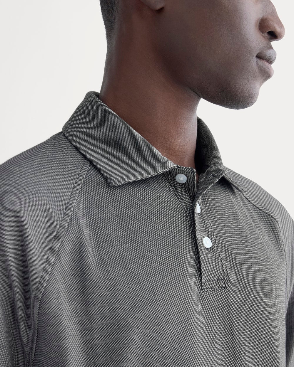 mens-startup-raglan-polo-black-chambray