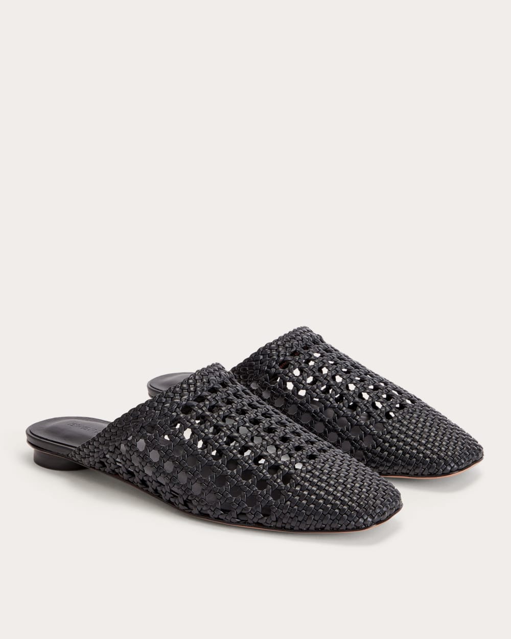 women-leather-day-mule-black-woven